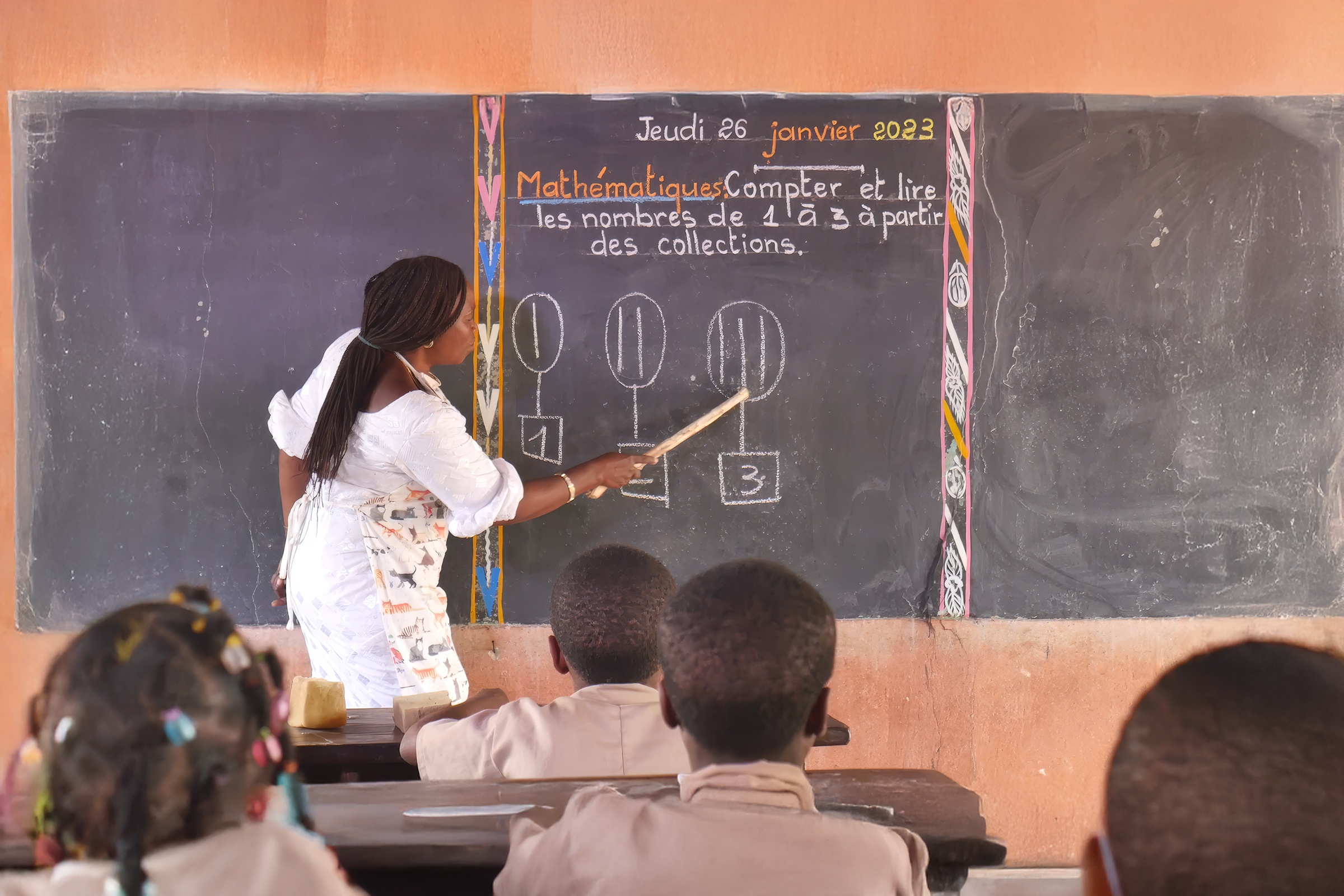 A teacher uses a new approach to teach the new math curriculum. Credit: Communication/UATS (Unite d’Appui Technique et de Suivi/PME3)